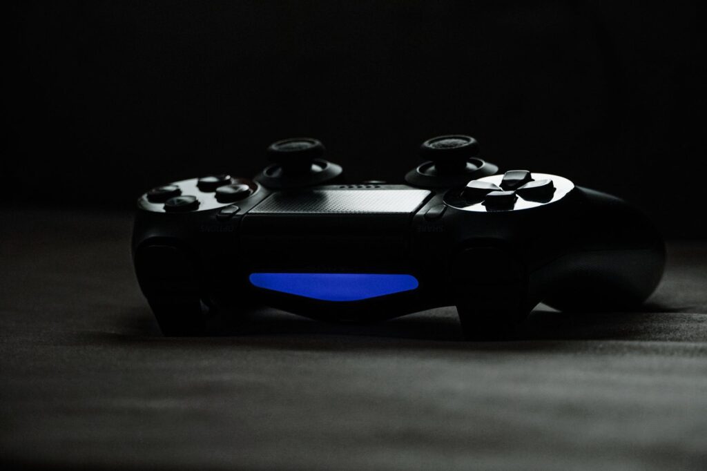 black and blue game controller